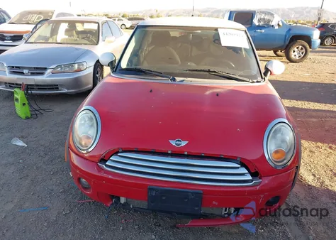 2010 Mini Cooper z USA, uszkodzony, nr VIN WMWMF3C52ATU79415